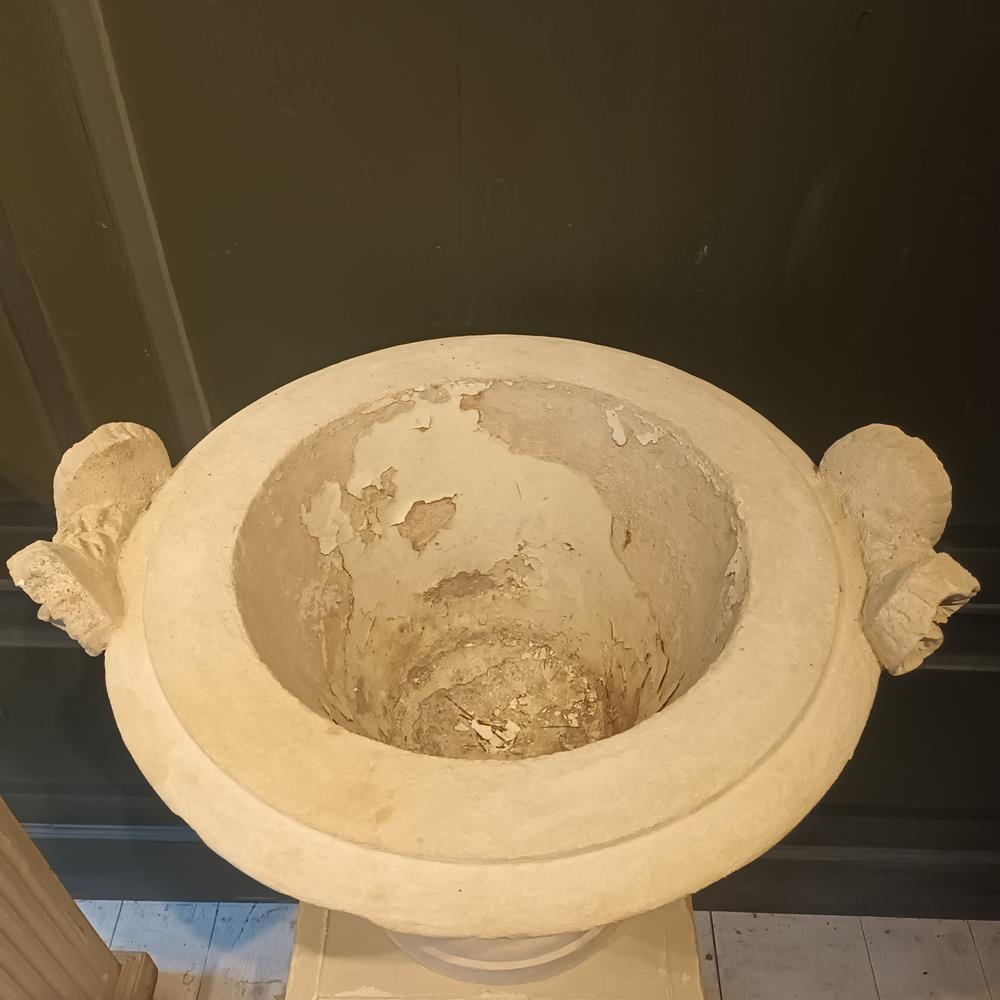 A Pair Of 19th Century Limestone Urns