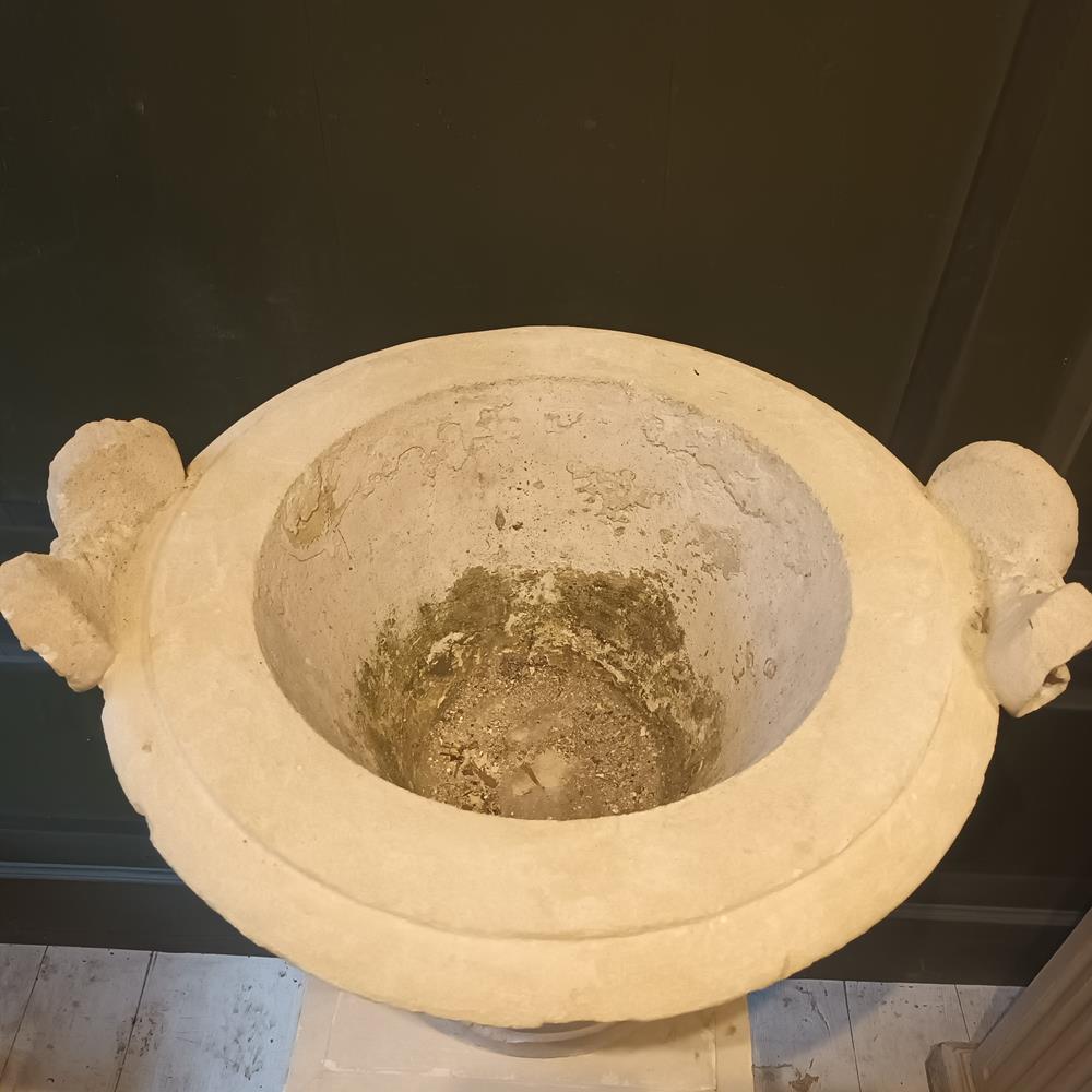 A Pair Of 19th Century Limestone Urns