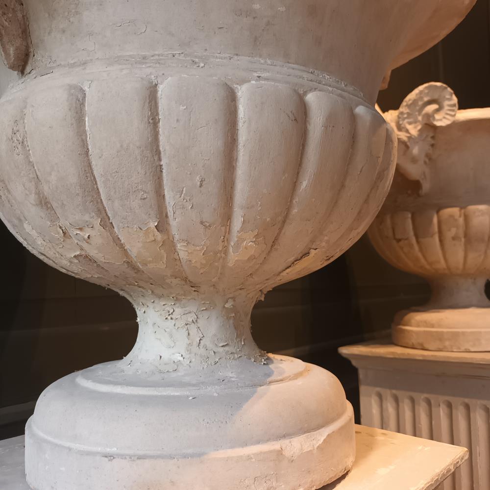 A Pair Of 19th Century Limestone Urns