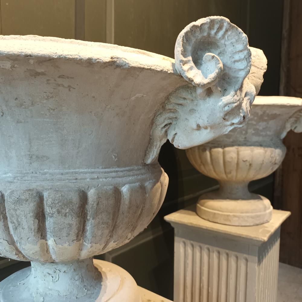 A Pair Of 19th Century Limestone Urns