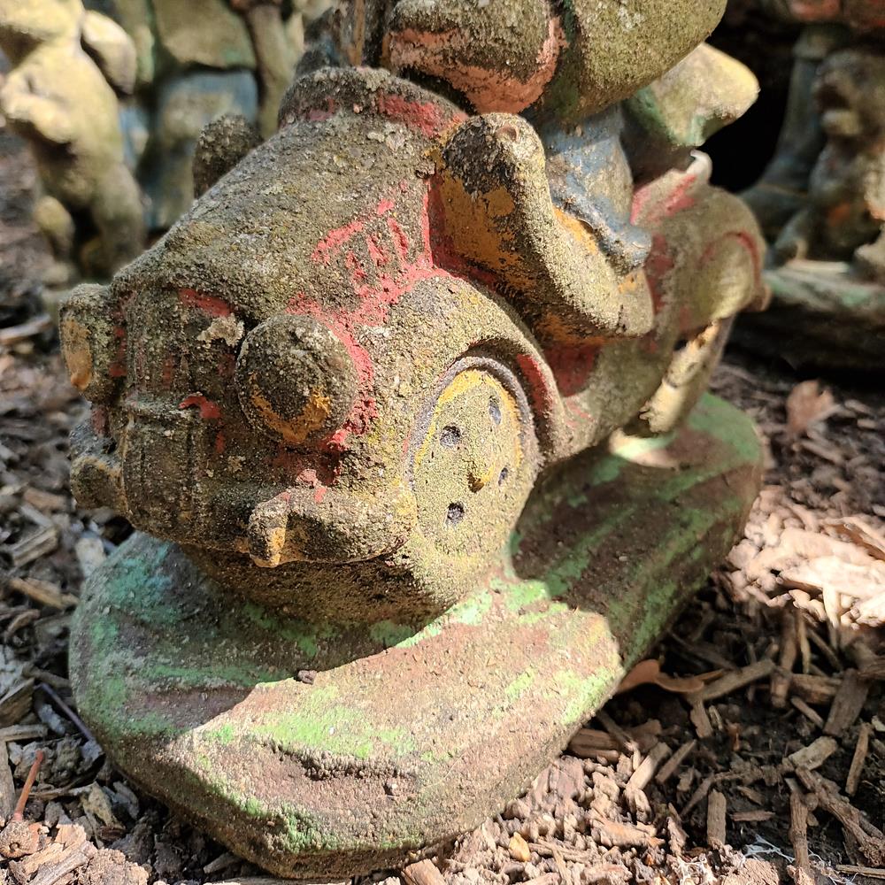 A Set Of Eight Garden Gnomes