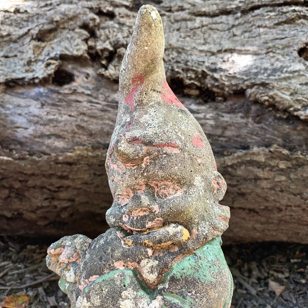 A Set Of Eight Garden Gnomes