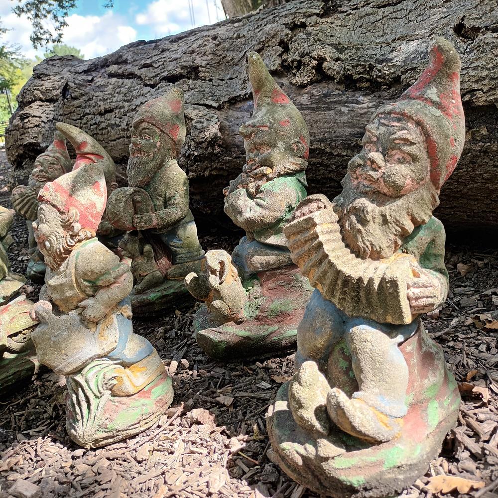 A Set Of Eight Garden Gnomes