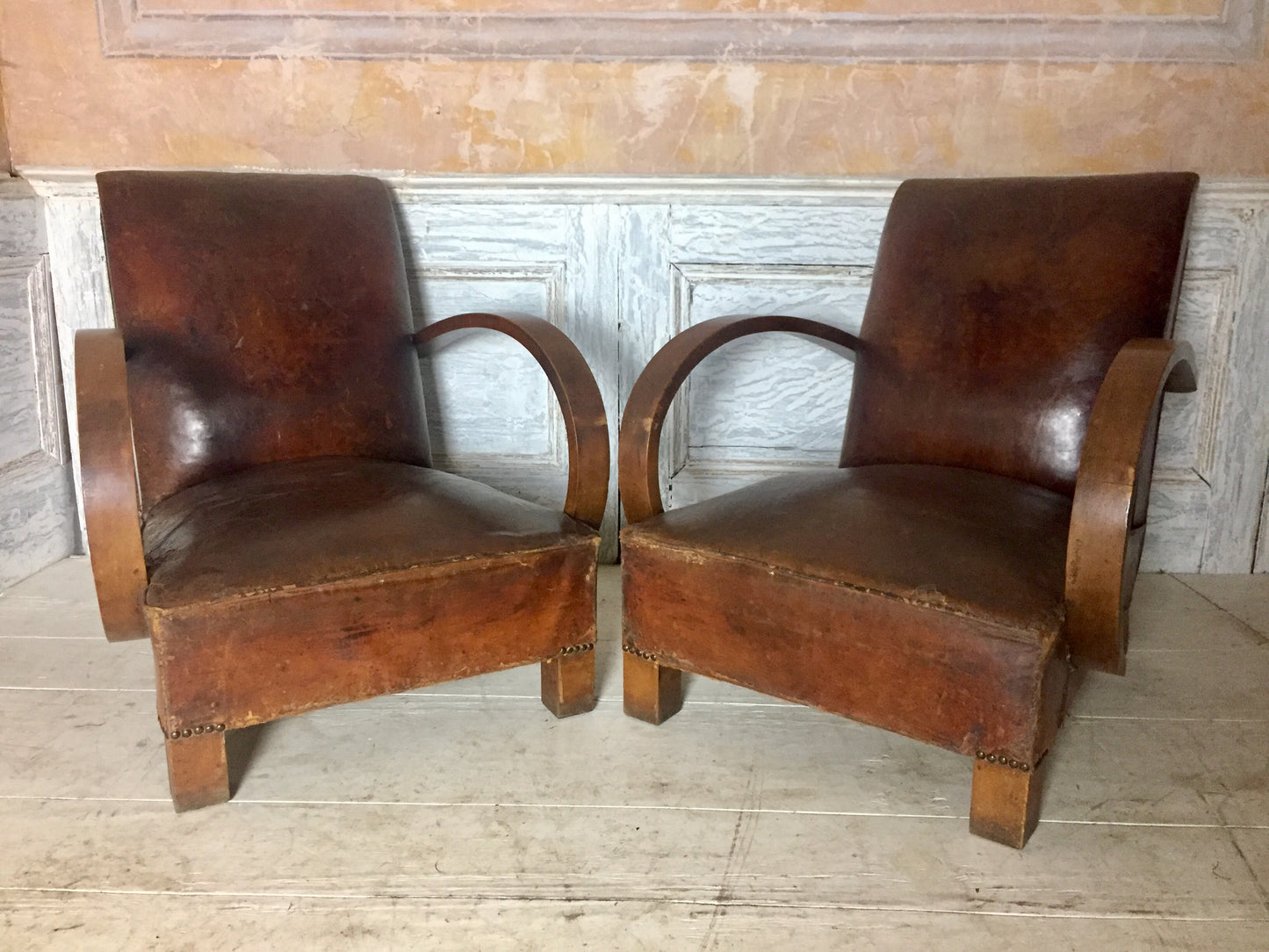 Pair Of Leather Arm Chairs