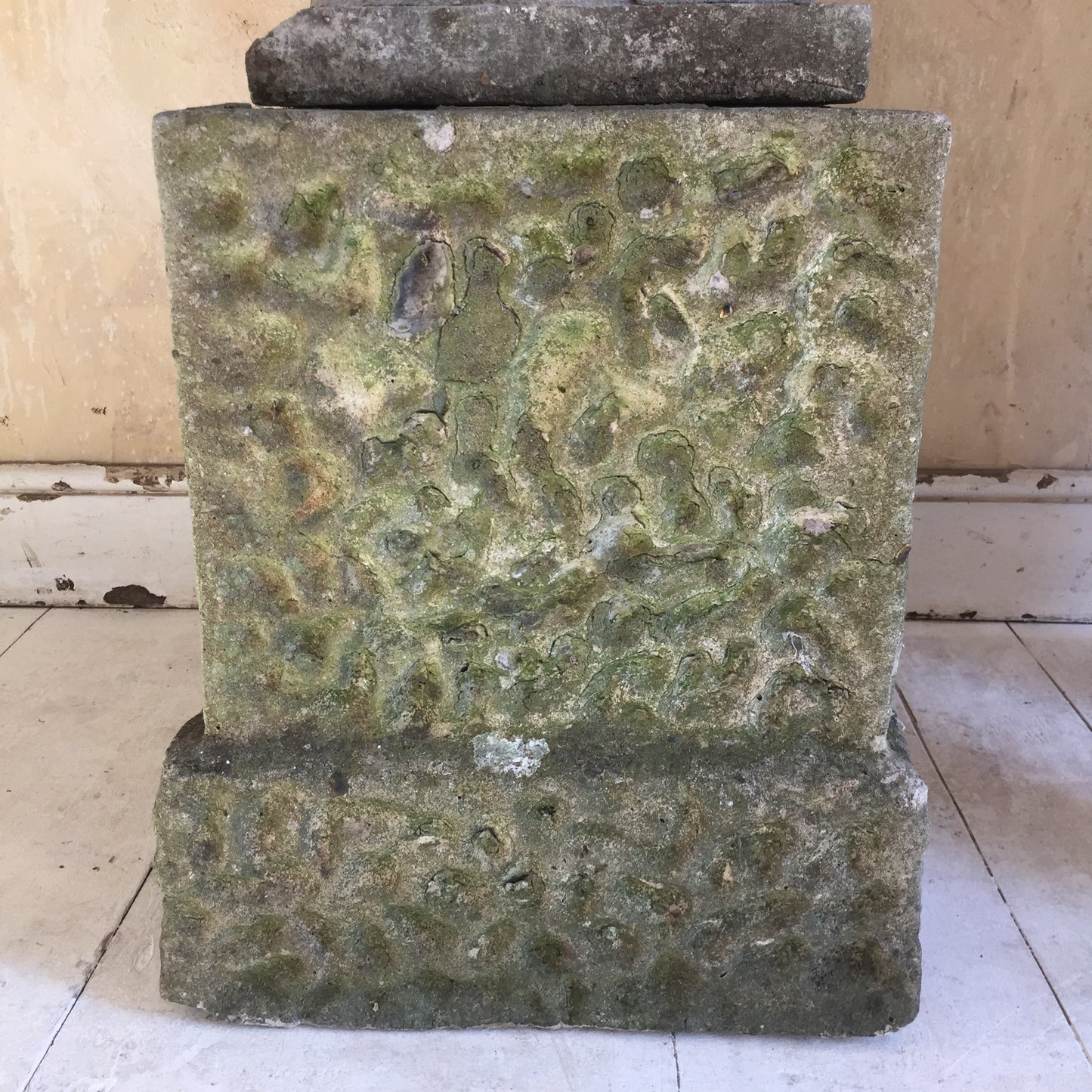 Urn On Rusticated Plinth