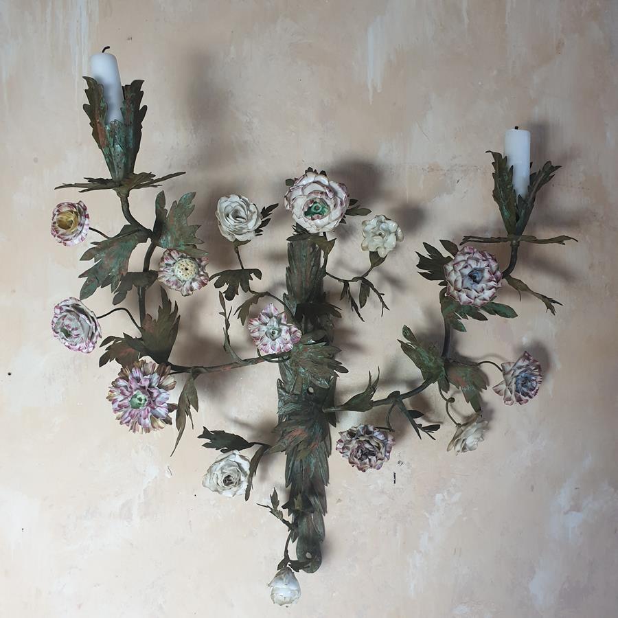 A pair of French painted tôle and porcelain wall-lights