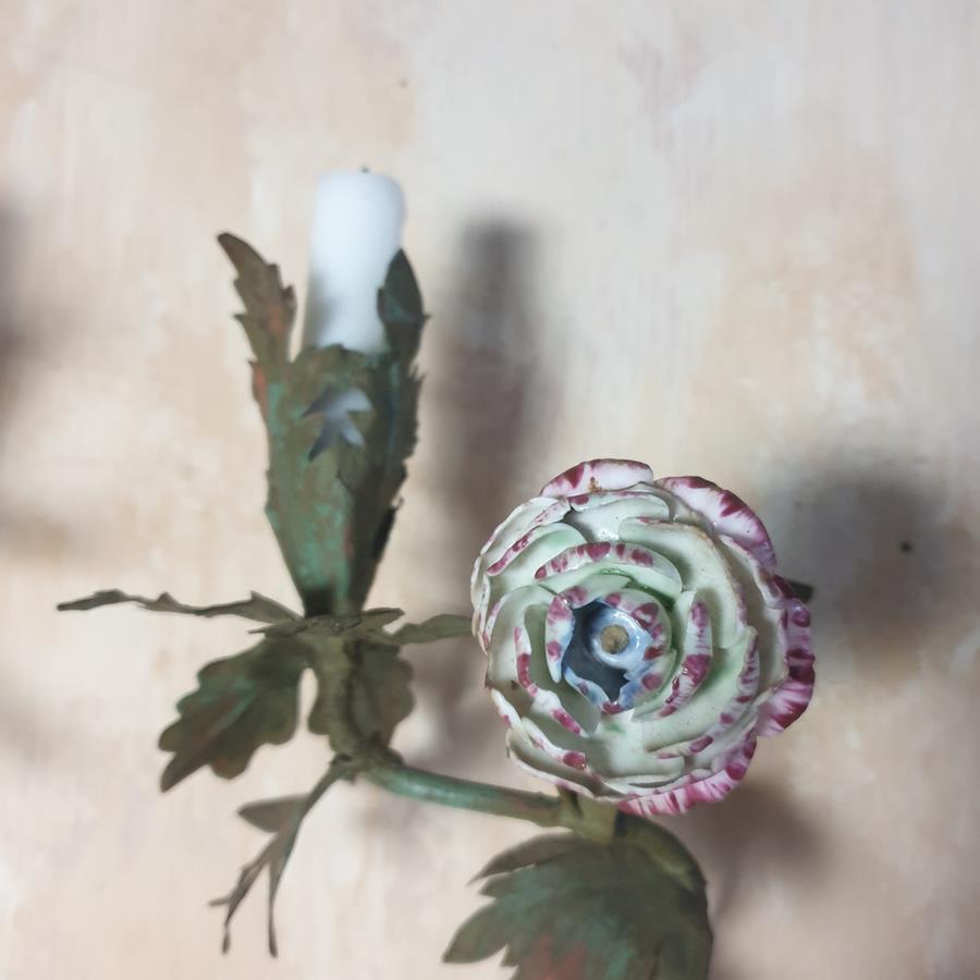 A pair of French painted tôle and porcelain wall-lights