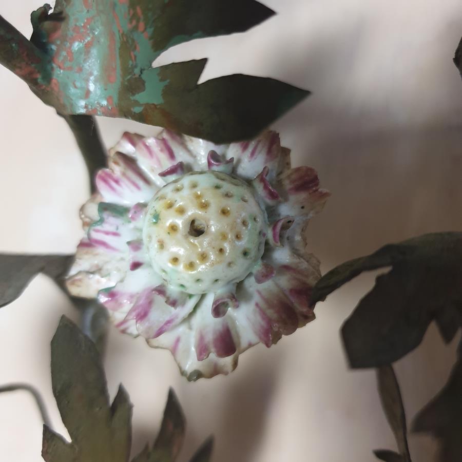 A pair of French painted tôle and porcelain wall-lights