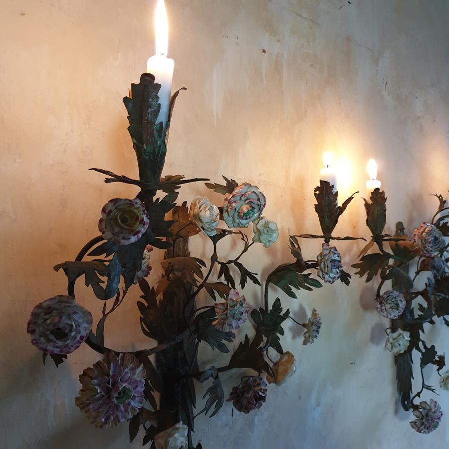 A pair of French painted tôle and porcelain wall-lights