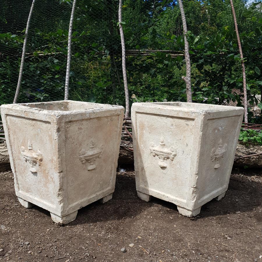 A Pair Of Stone Planters