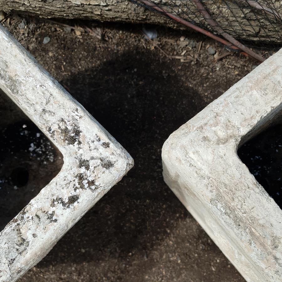 A Pair Of Stone Planters