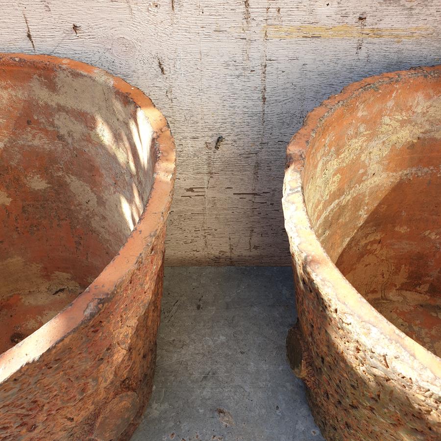 A Pair Of Faux Bois Planters