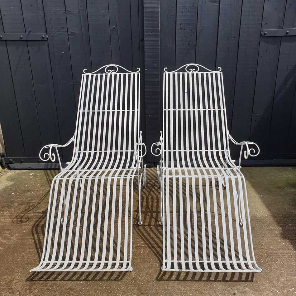 A Pair Of Painted Iron Sun Loungers