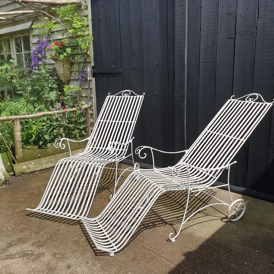 A Pair Of Painted Iron Sun Loungers