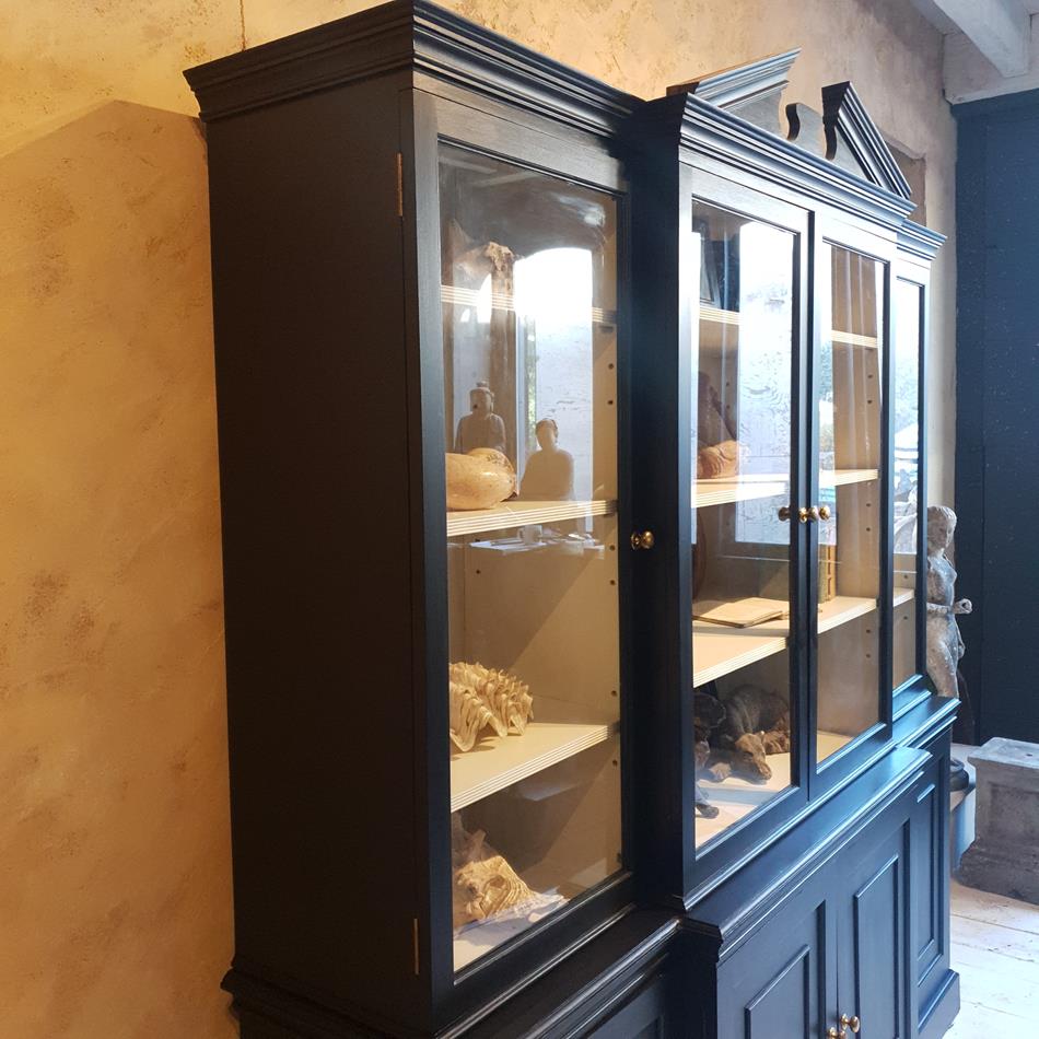 A 20th Century Ebonised Break Front Display Cabinet