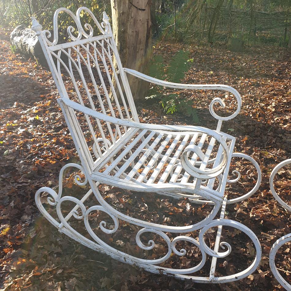 A Pair Of French Iron Rocking Chairs