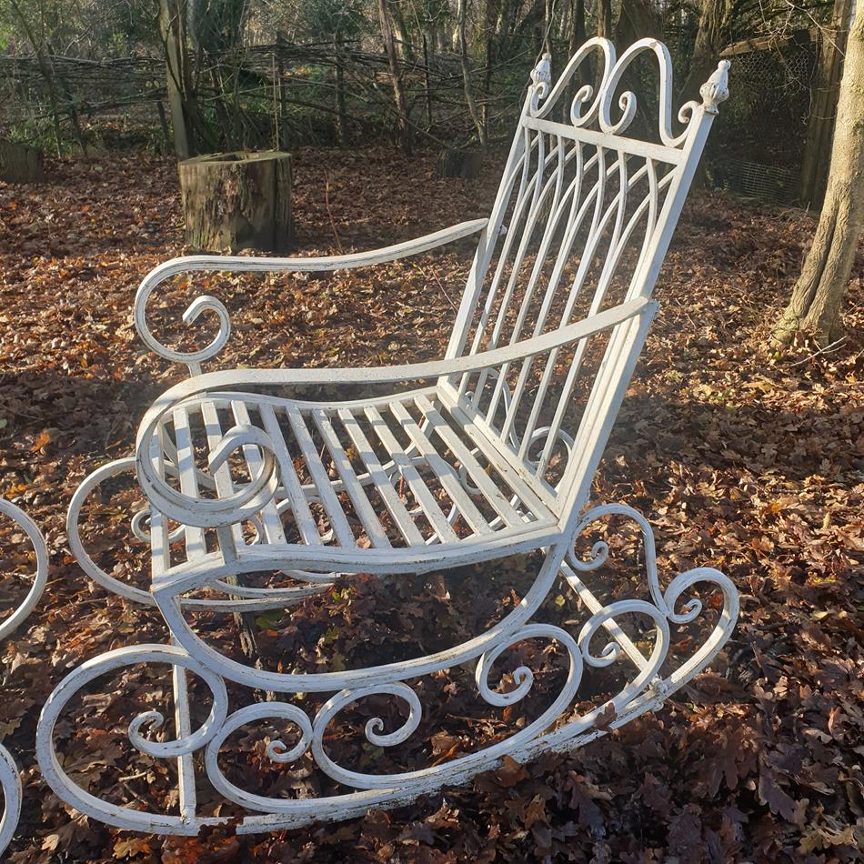 A Pair Of French Iron Rocking Chairs