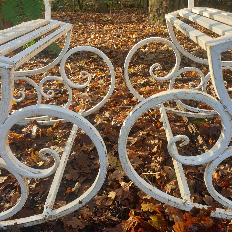 A Pair Of French Iron Rocking Chairs