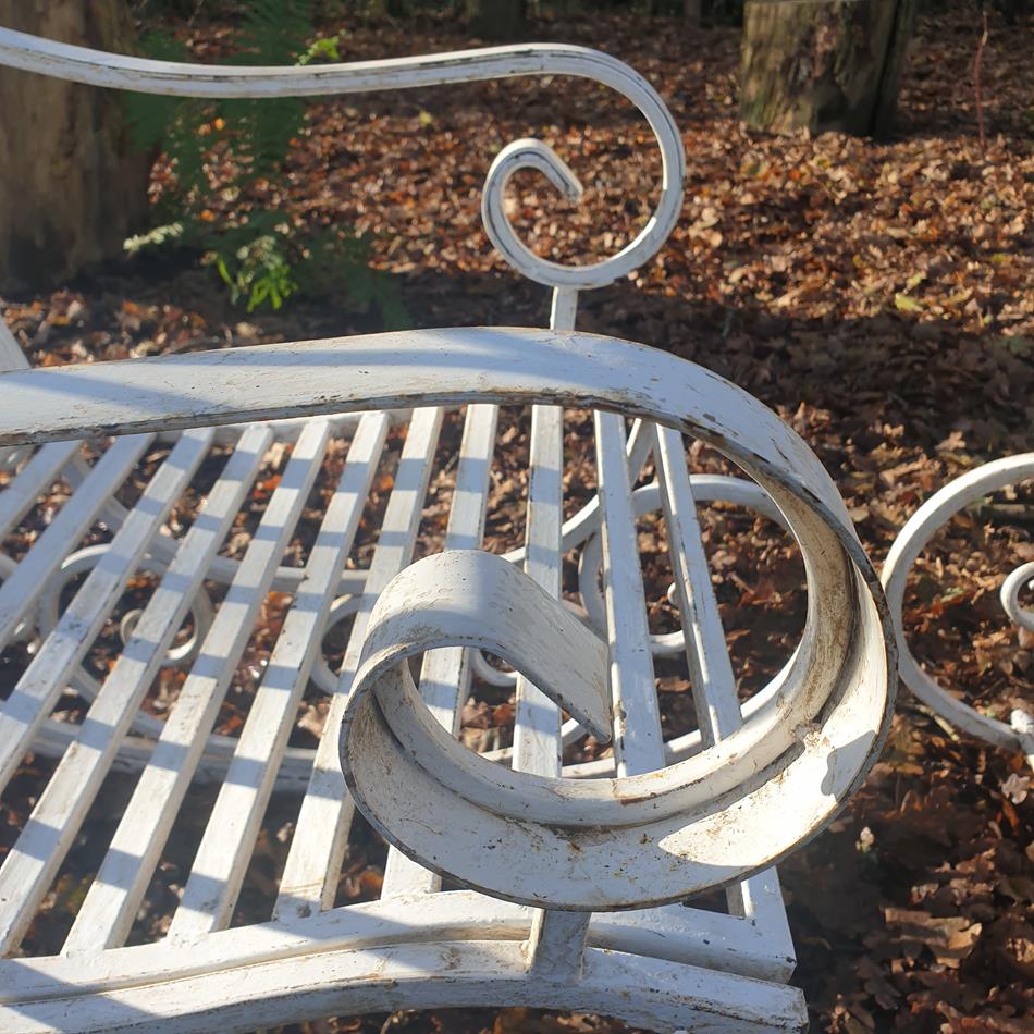 A Pair Of French Iron Rocking Chairs