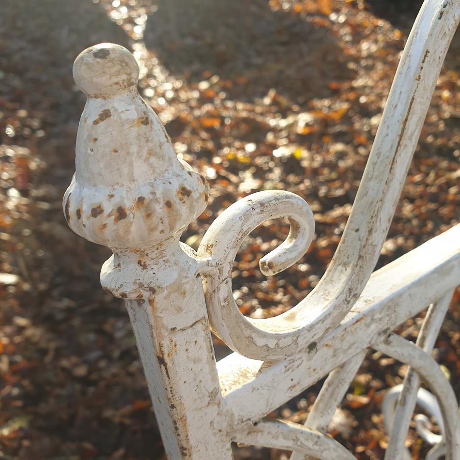 A Pair Of French Iron Rocking Chairs