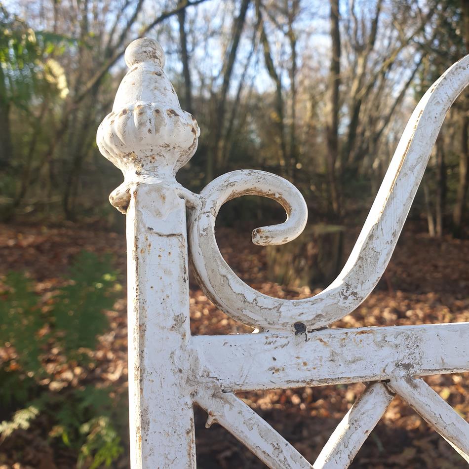 A Pair Of French Iron Rocking Chairs