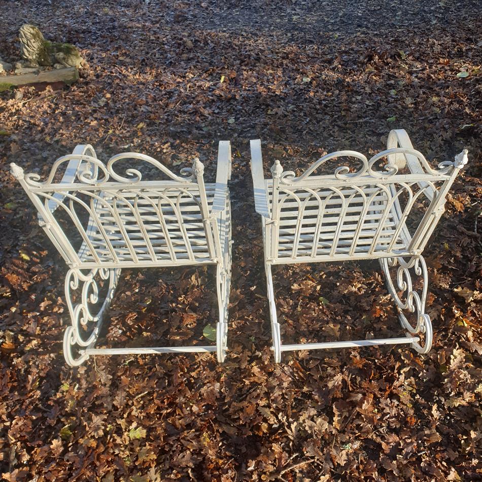 A Pair Of French Iron Rocking Chairs