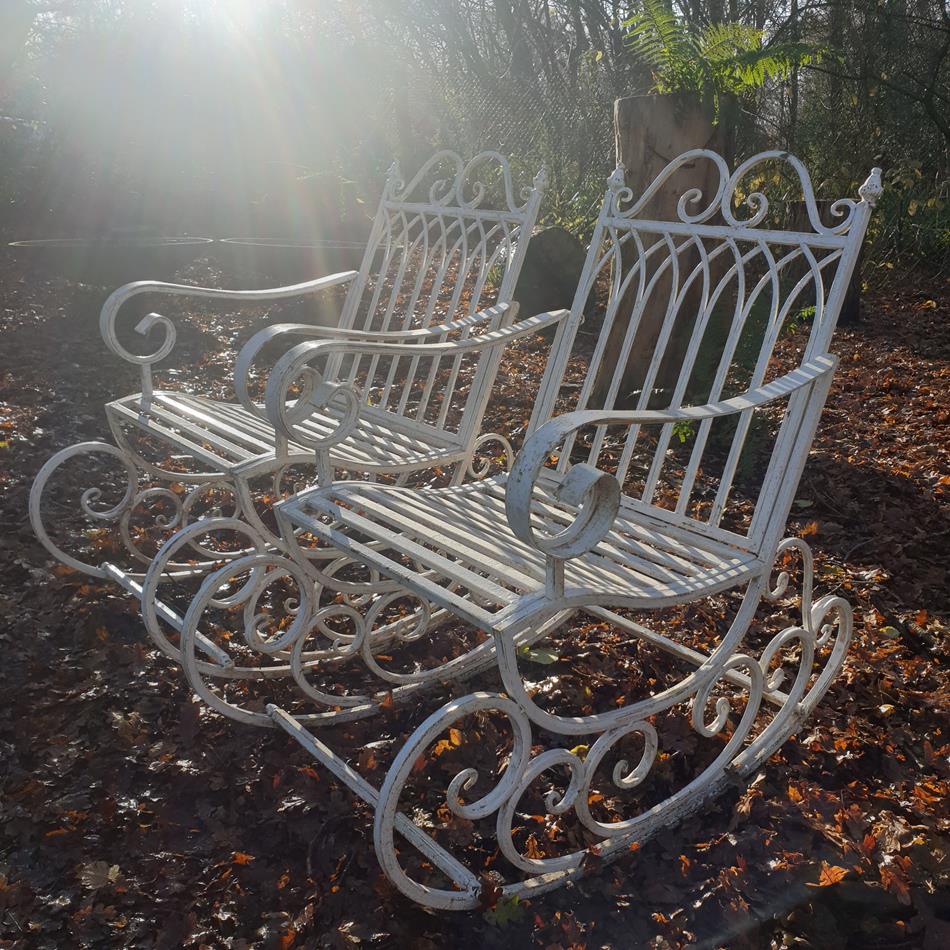 A Pair Of French Iron Rocking Chairs
