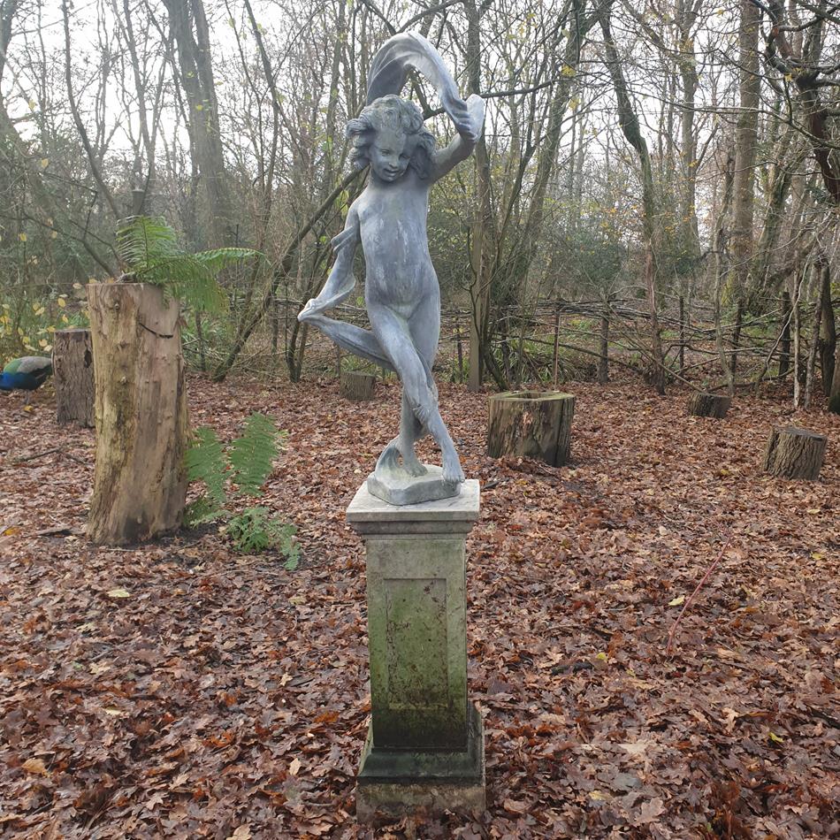 Lead Girl With Ribbon Sculpture