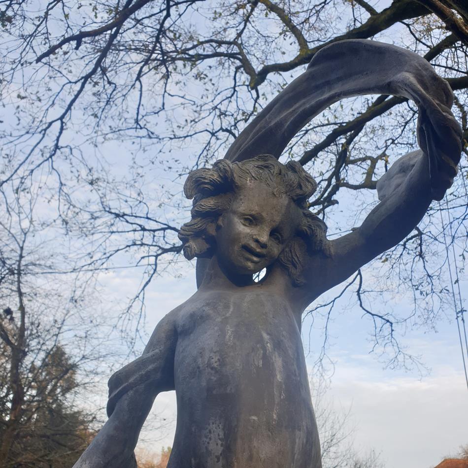 Lead Girl With Ribbon Sculpture