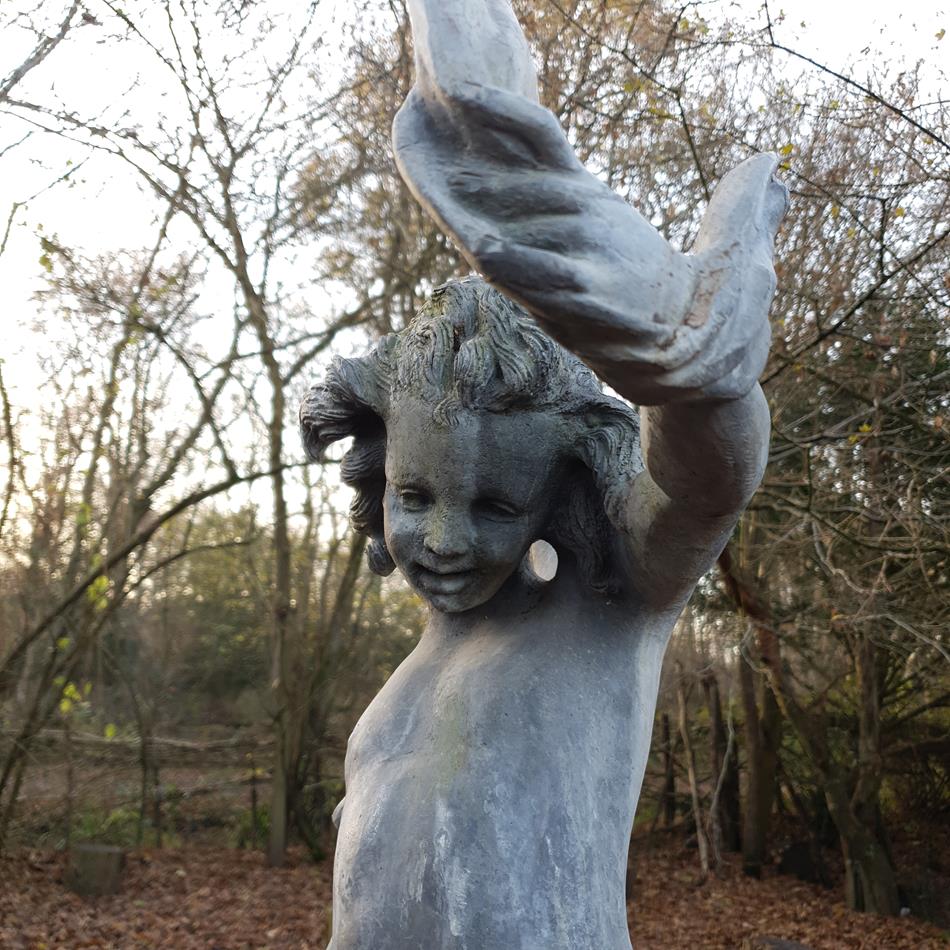Lead Girl With Ribbon Sculpture
