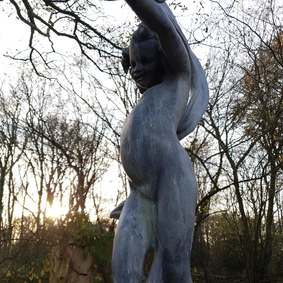 Lead Girl With Ribbon Sculpture