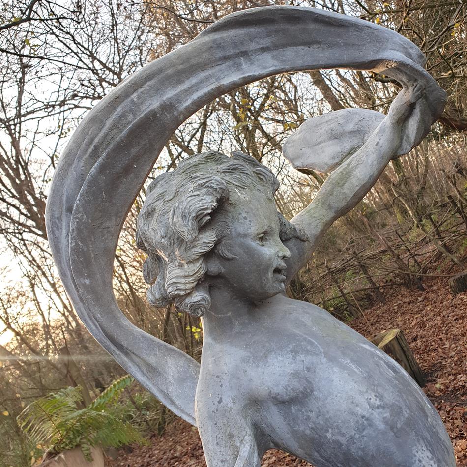 Lead Girl With Ribbon Sculpture