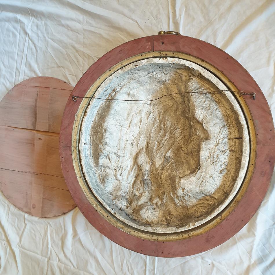 A Pair Of Plaster Roundels