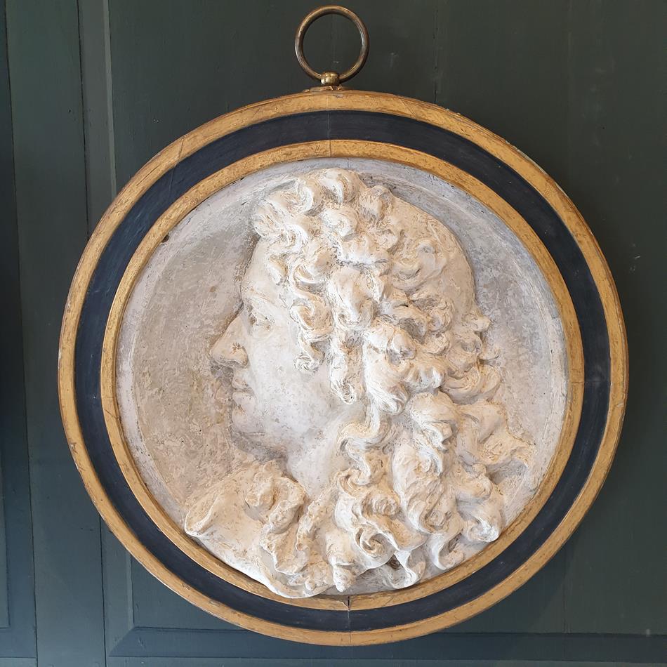 A Pair Of Plaster Roundels