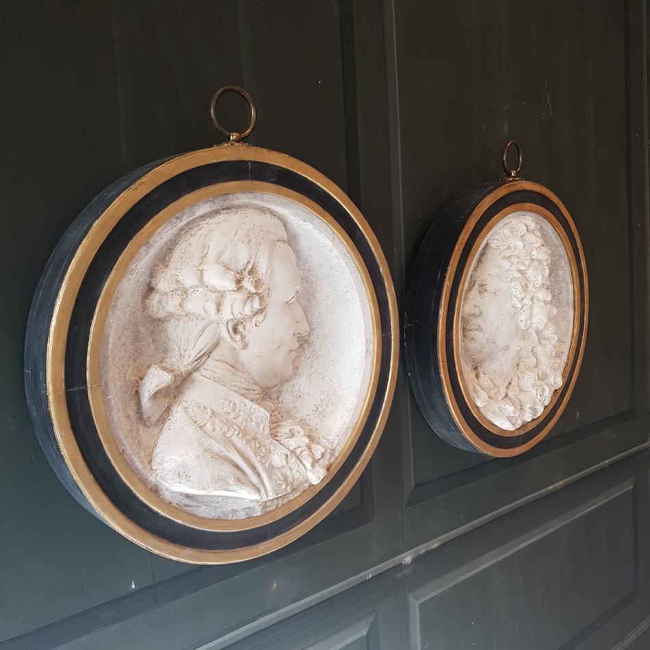 A Pair Of Plaster Roundels