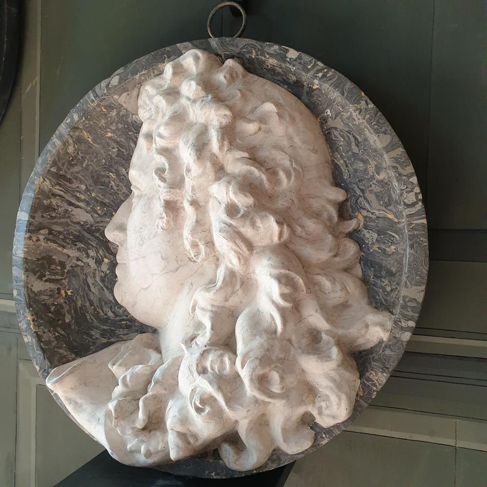 A Pair Of Scagliola Roundels