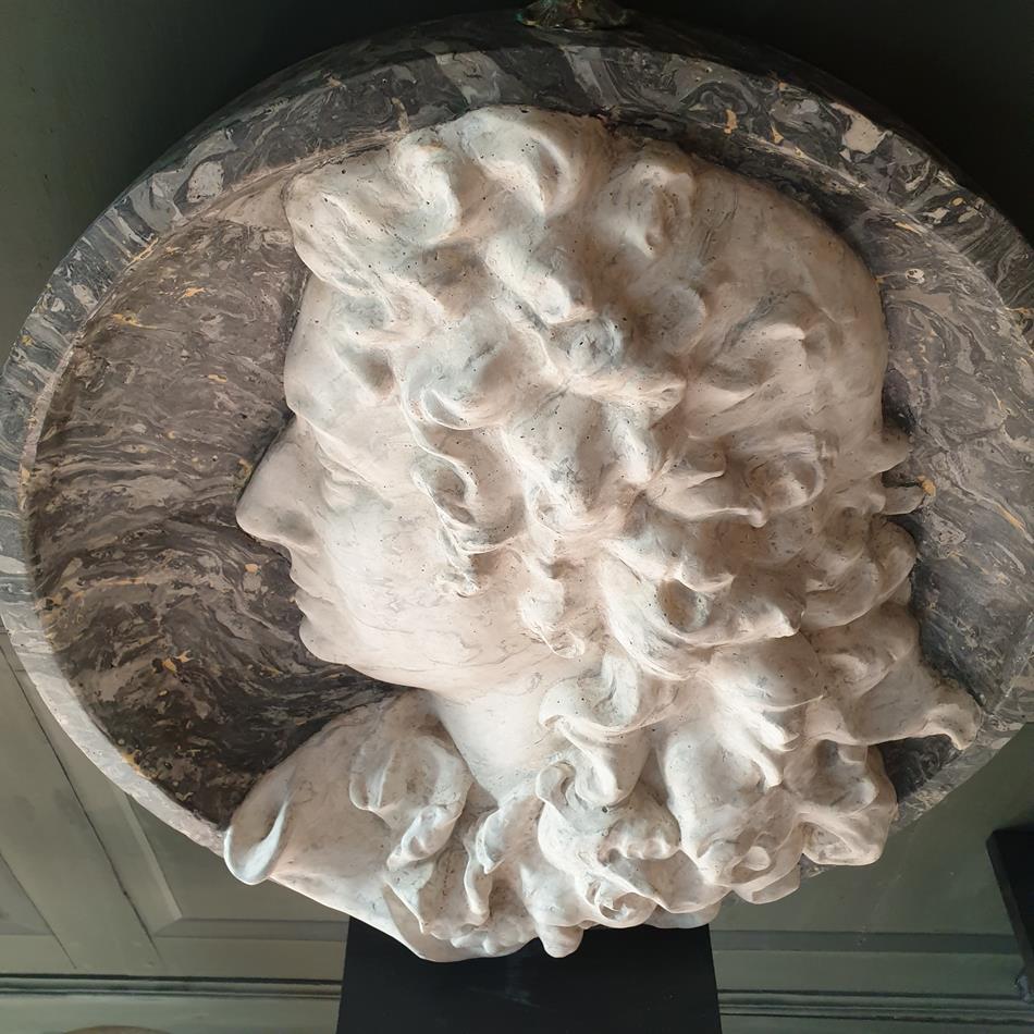 A Pair Of Scagliola Roundels