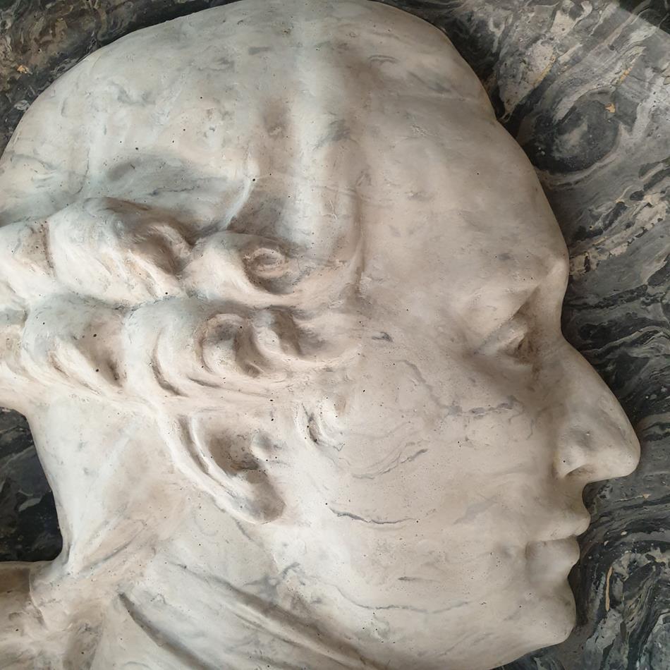 A Pair Of Scagliola Roundels