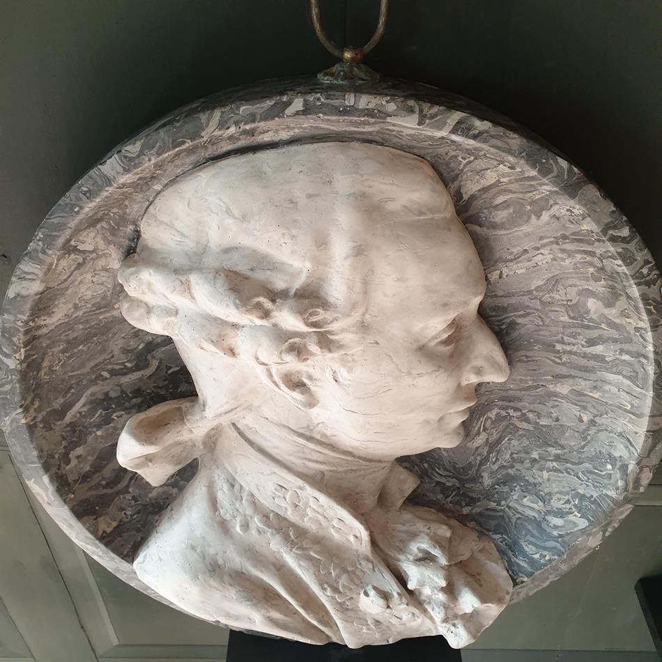 A Pair Of Scagliola Roundels