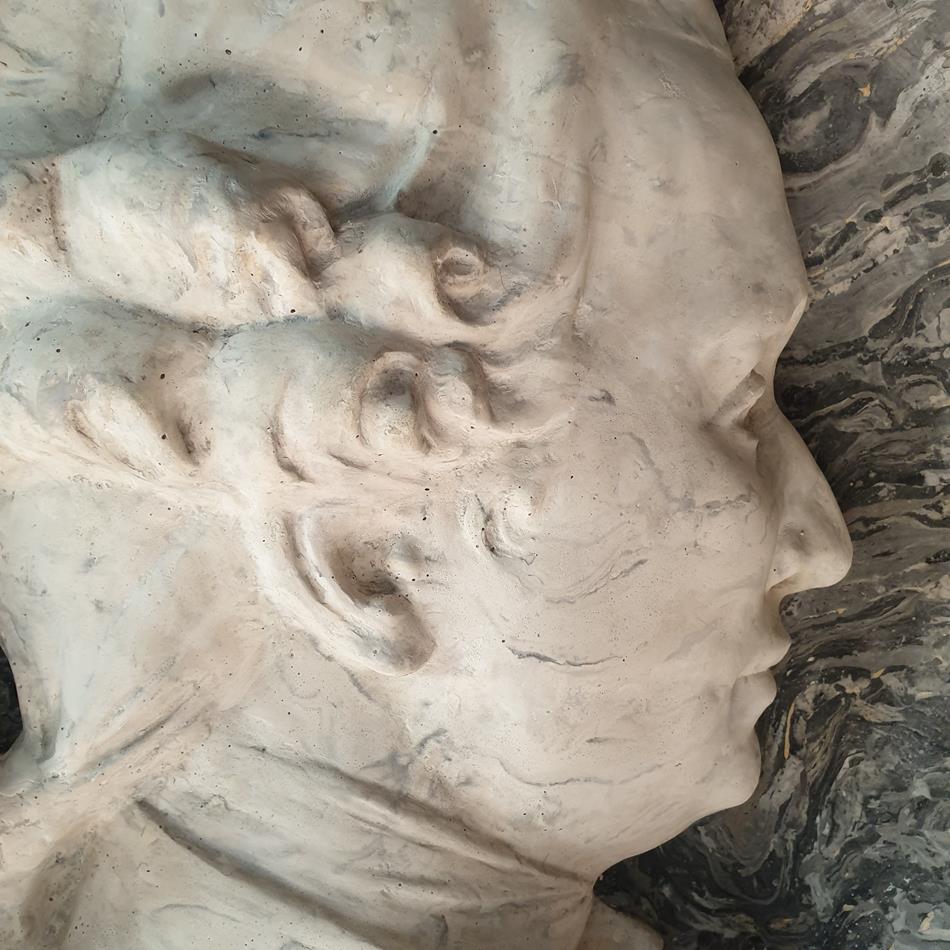 A Pair Of Scagliola Roundels