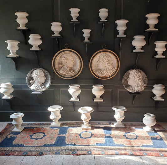 A Pair Of Scagliola Roundels