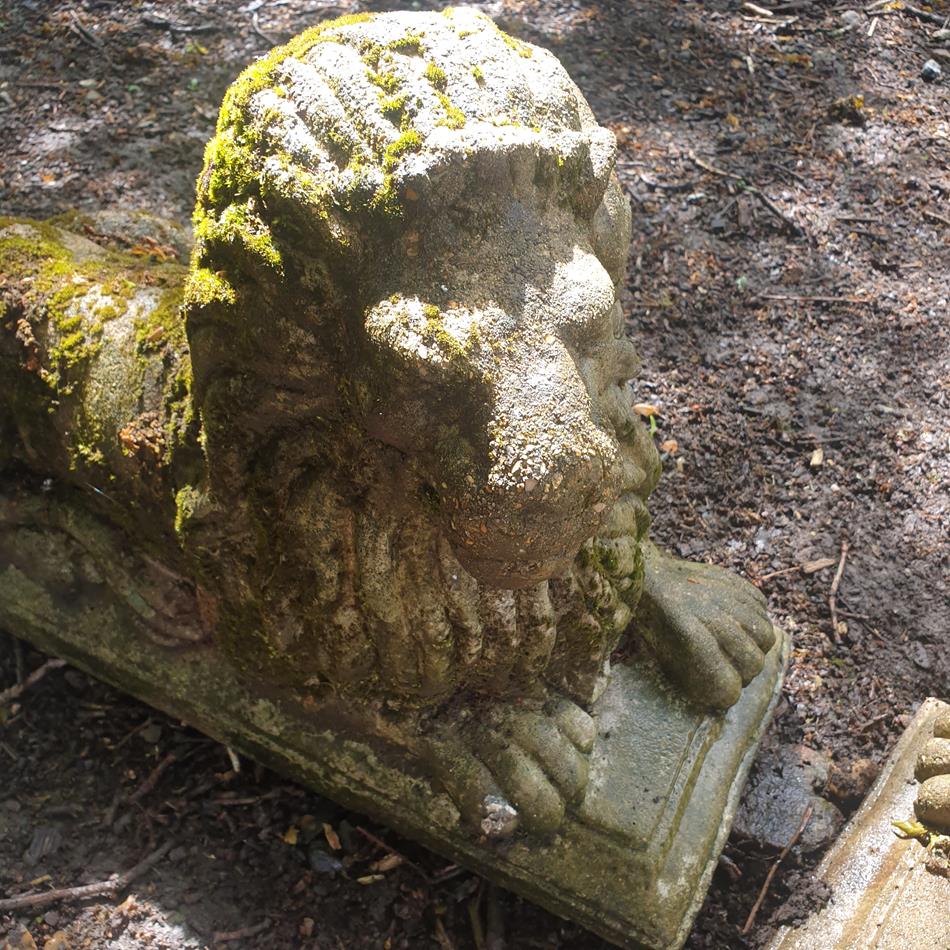 A Pair Of Recumbent Lions