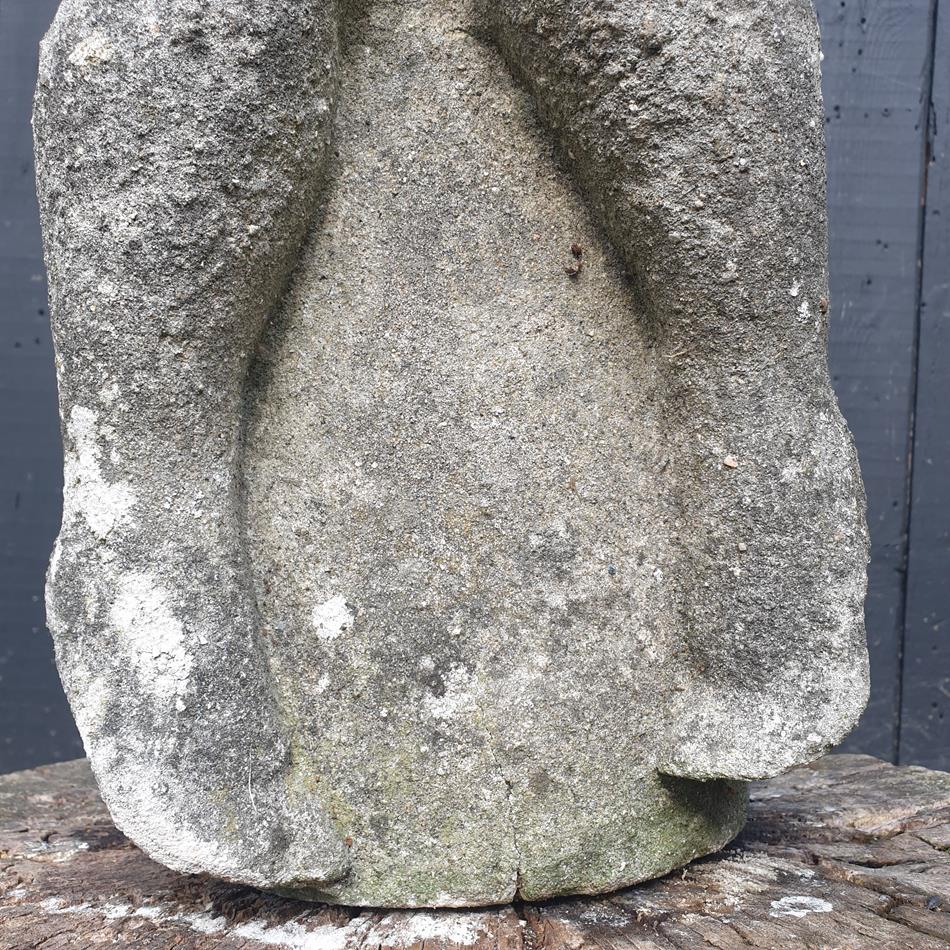 Statue Of A Sitting Girl