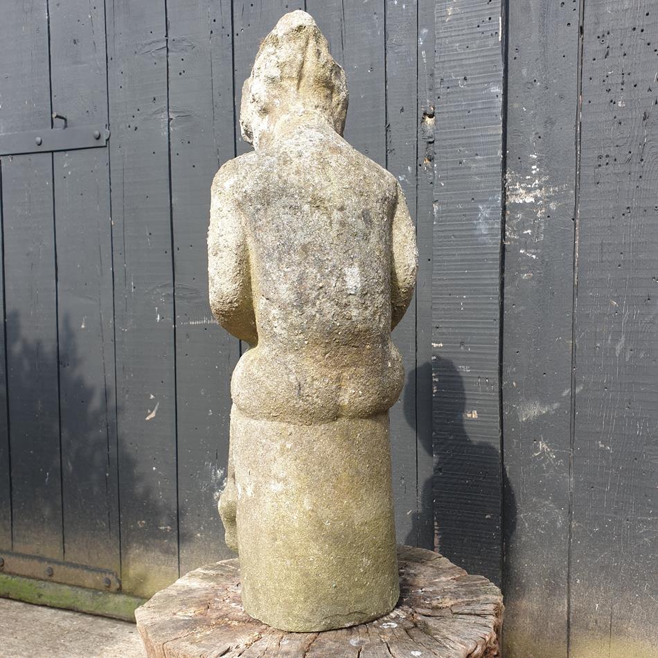 Statue Of A Sitting Girl