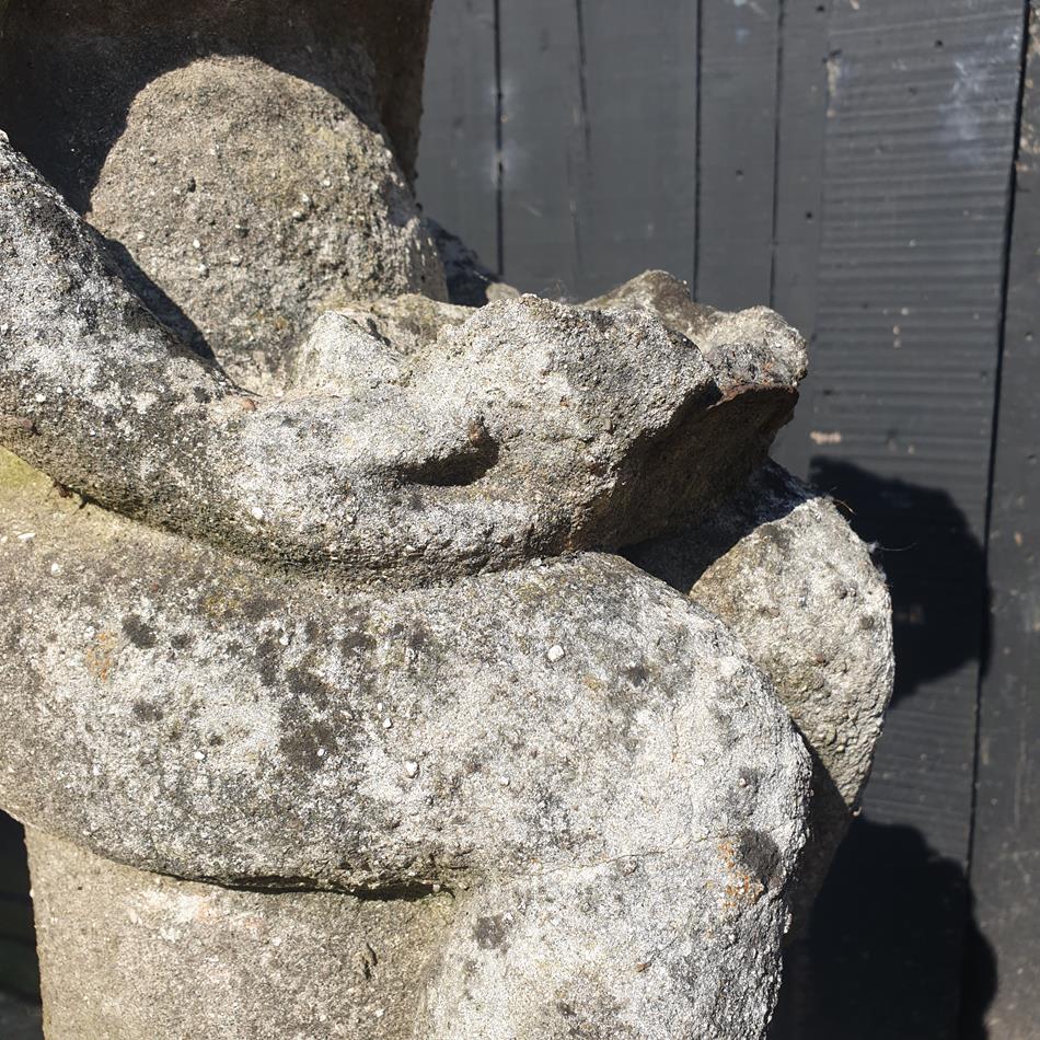 Statue Of A Sitting Girl