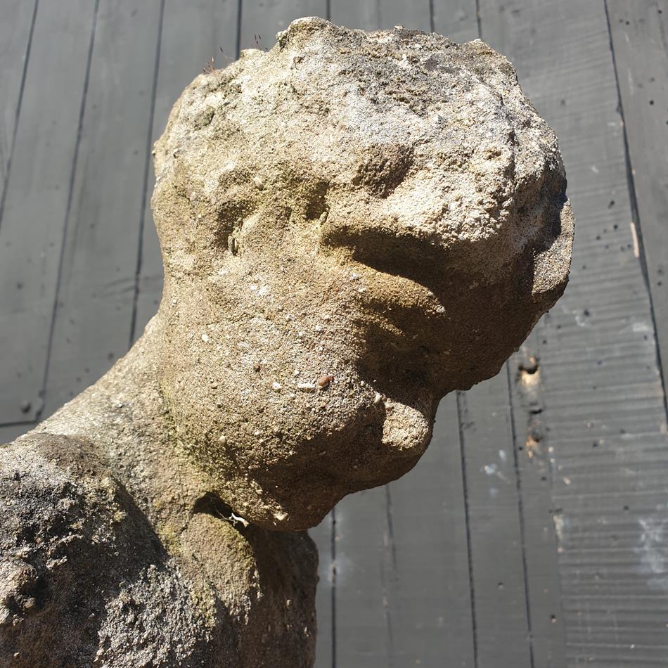 Statue Of A Sitting Girl