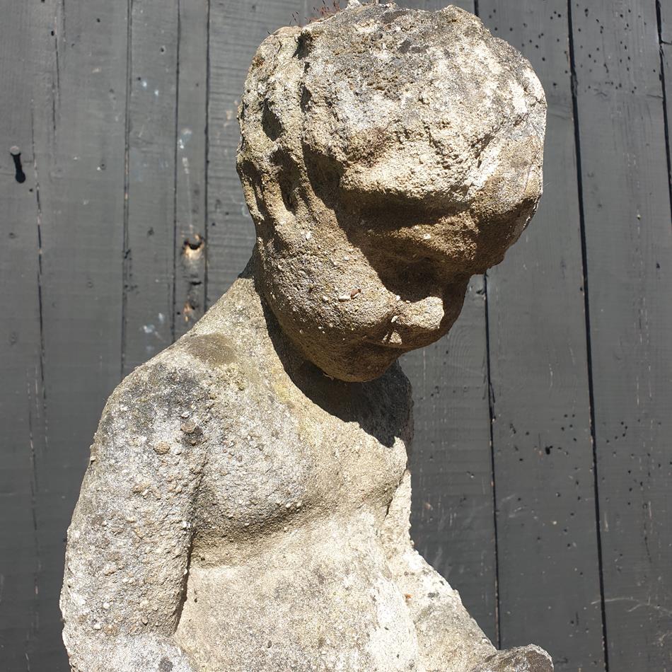 Statue Of A Sitting Girl