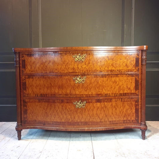 A Late 19th Century Serpentine Satinwood Commode