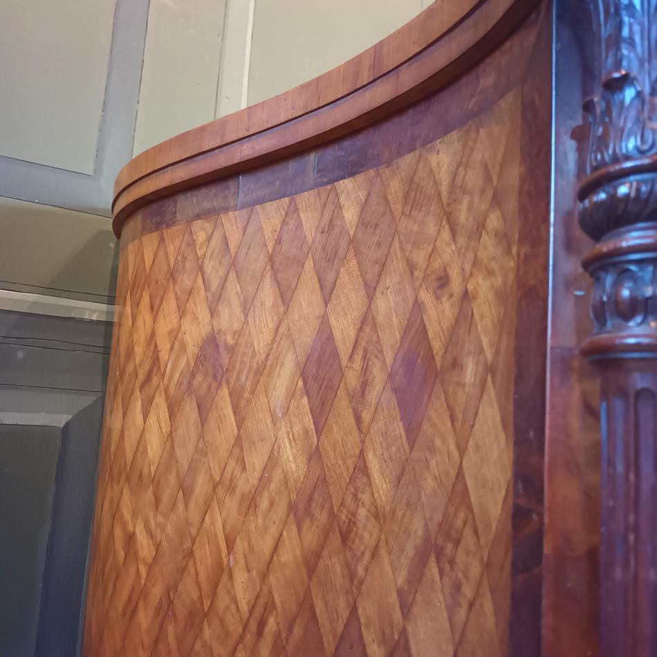 A Late 19th Century Serpentine Satinwood Commode