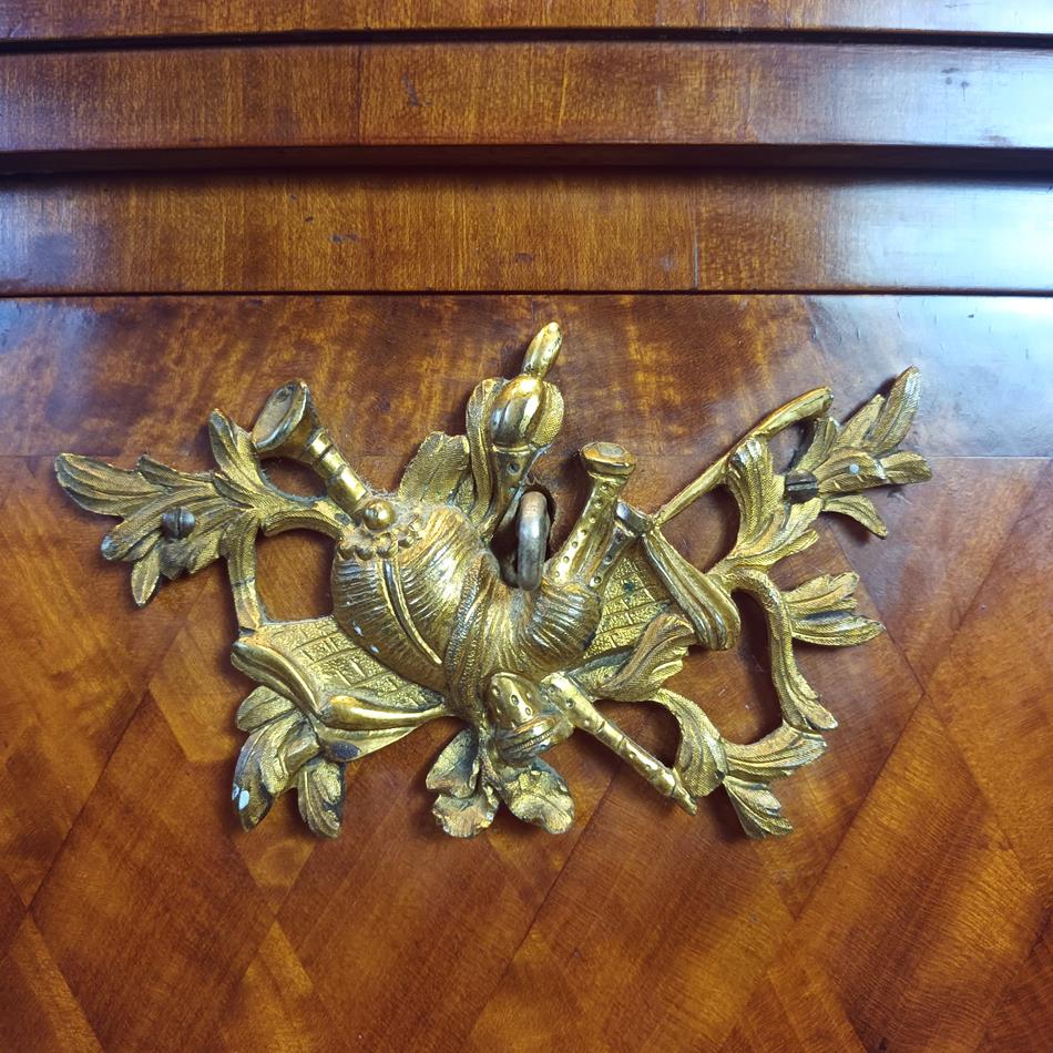 A Late 19th Century Serpentine Satinwood Commode